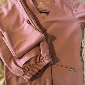 Selling these figs, size small worn twice.